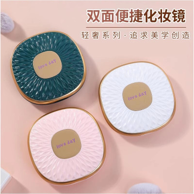 高端化妆镜子折叠创意化妆镜迷你手持双面学生可爱随身便携