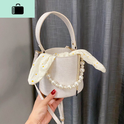 网红小包包女包2020新款潮夏季百搭单肩斜挎包时尚珍珠手提水桶包NEW LAKE女斜挎包