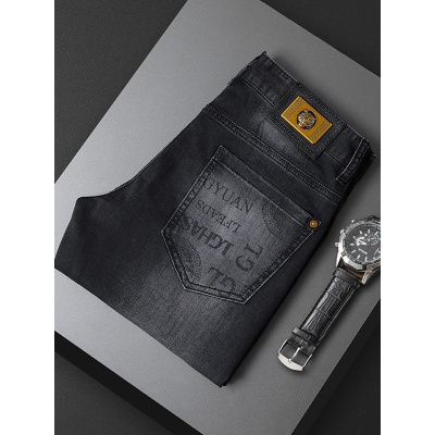 男款牛仔裤虎头黑色高端小脚裤男生轻奢印花弹力长裤男士