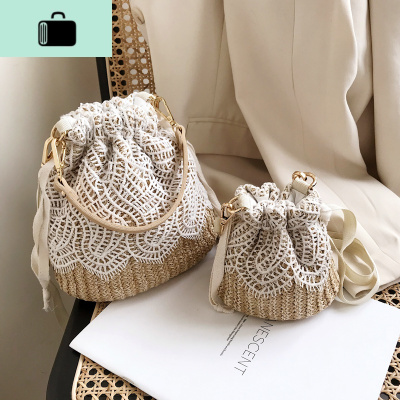 夏天独特小包包女包2020流行新款潮时尚编斜挎包百搭蕾丝水桶包NEW LAKE女士单肩包