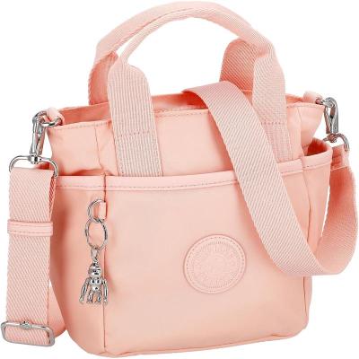 Kipling凯浦林单肩包女实用便携容量大耐磨粉色多口袋轻便时尚