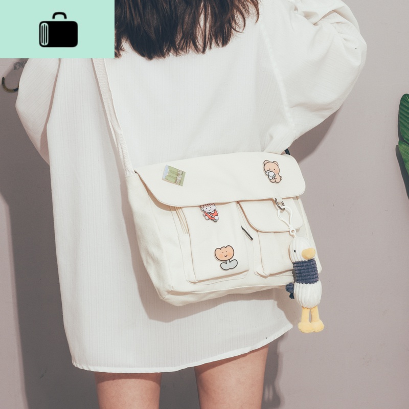 大容量帆布包包女2020新款潮大学生上课的斜挎包女森系文艺邮差包NEW LAKE女斜挎包