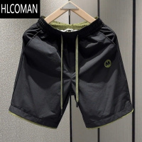 HLCOMAN夏季轻薄透气时尚速干休闲短裤男宽松百搭拼接潮流运动五分裤