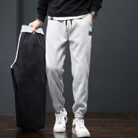 秋冬新款男生加绒卫裤时尚男士休闲裤厚款棉裤束脚九分裤韩版
