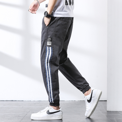 休闲裤男士2021春夏季新款潮韩版宽松束脚裤条纹运动裤抽绳青年学生九分裤哈伦裤gurunvani