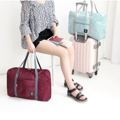 派尼美特手提旅行袋行李包衣物袋防水行李袋可套拉杆防水男女过年回家提包