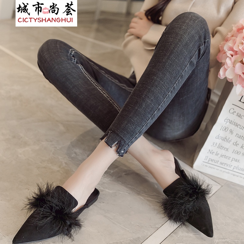 新款高腰牛仔裤弹力紧身不规则脚边牛仔九分裤