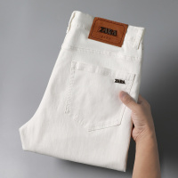 高端春夏季裤子潮小脚休闲纯白色春装男士奢牛仔裤长弹力修身男装