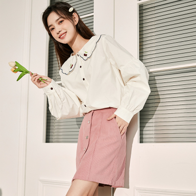 [3件8.5折101.9元,叠加优惠券]唐狮秋冬新款女装粉色半身裙灯芯绒排扣甜美少女a字包臀短裙