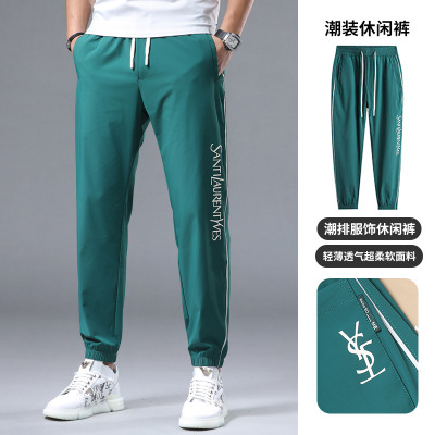 夏季薄款男士休闲刺绣印花修身弹力运动束脚长裤_1