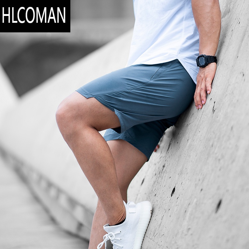 HLCOMAN 运动短裤弹力透气健身三分裤秋速干跑步四分裤男蹲腿裤