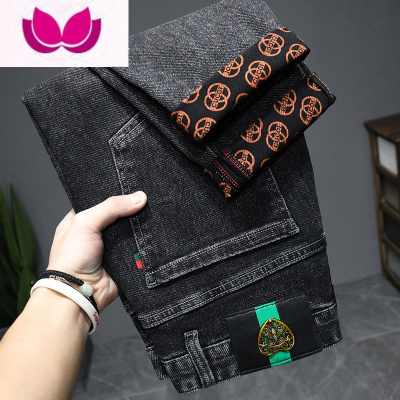 七斓潮牌高端欧美新塘牛仔裤男士修身小脚潮流百搭弹力裤子薄款