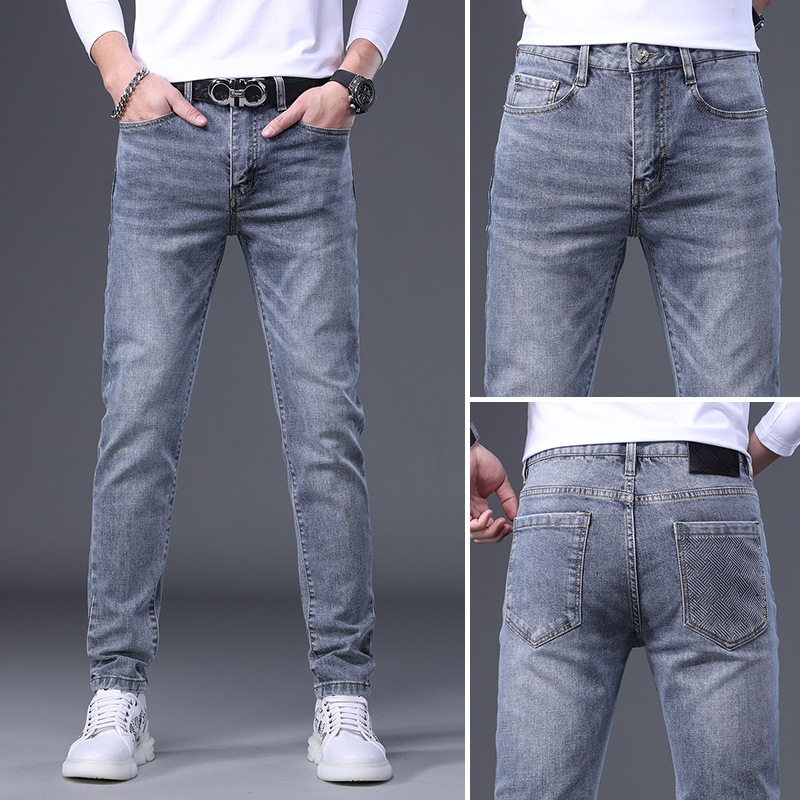 轻奢欧货春夏季新款潮牌印花修身牛仔裤男士百搭休闲小脚裤子