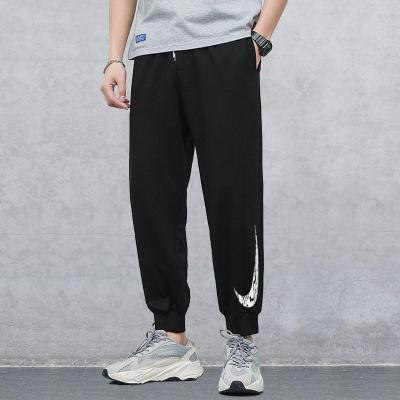 Nike耐克长裤男2021春季新款正品印花跑步运动长裤DA0165-010