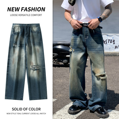一字割破磨白牛仔裤男独特宽松AC潮款灼烧牛仔长裤男炒盐水洗潮牌