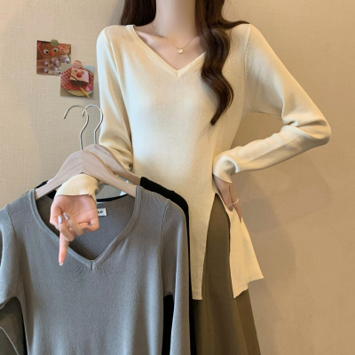 早秋新款V领显瘦打底针织衫时尚开叉不规则设计感长袖纯色上衣潮