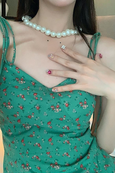 蝴蝶结印花包臀连衣裙女夏季性感低胸绑带吊带A字裙短裙子沙滩裙