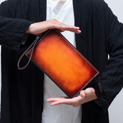 赫泽琼斯HEZZJONS新款小手包进口意大利牛皮手机包青年商务休闲真皮手腕包情侣手拿包生日礼物定制包包